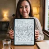 Une personne colorie le livre de coloriage Jésus-Christ sur un iPad