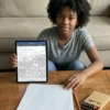 A person colouring the The Incas Empire coloring book on an iPad