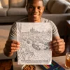A person colouring a printed page from the World War II coloring book